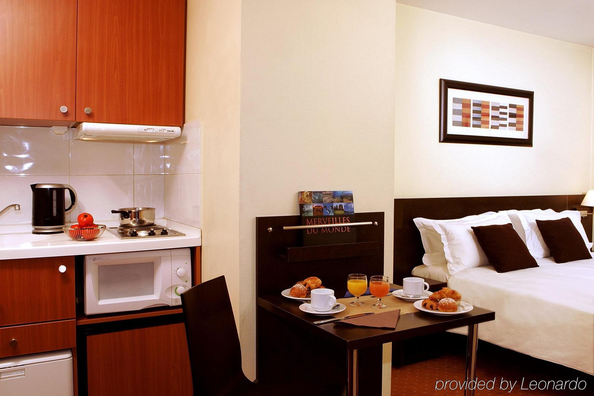 Citadines La Defense Paris Lejlighedshotel Courbevoie Værelse billede
